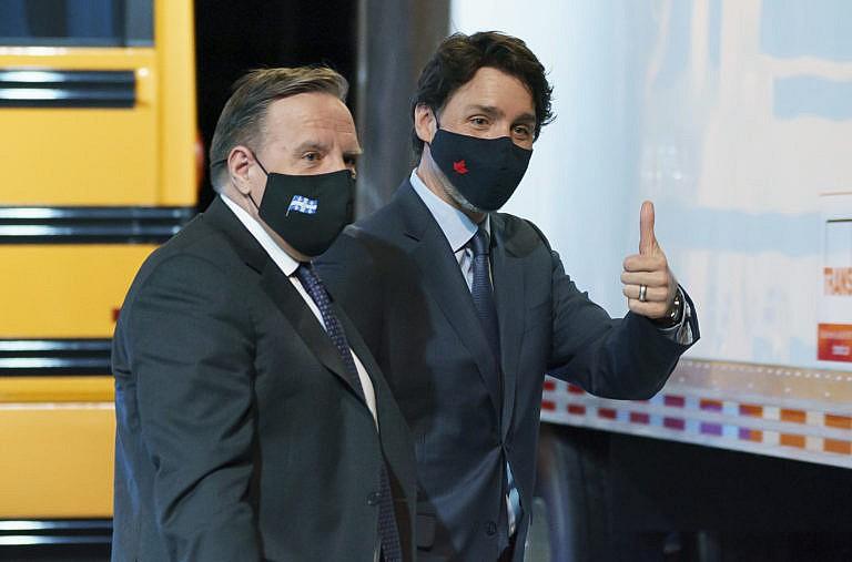 Trudeau leaves a news conference accompanied by Legault in Montreal, on March 15, 2021 (Paul Chiasson/CP)