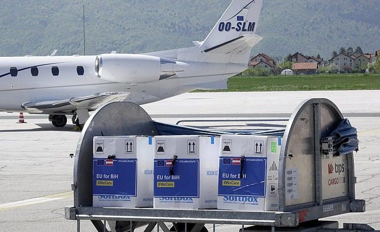 A container with boxes of the Pfizer vaccine for COVID-19 is delivered at the Sarajevo Airport, Bosnia, on May 4, 2021 (AP Photo/Eldar Emric, File)