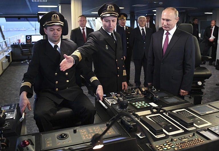 Putin, right, visiting the bridge of the newly built icebreaker Viktor Chernomyrdin in St. Petersburg, Russia, in November. Russia is rapidly expanding its fleet of icebreakers as it expands its reach in the Arctic. (Alexei Nikolsky, Sputnik, Kremlin Pool Photo via AP)