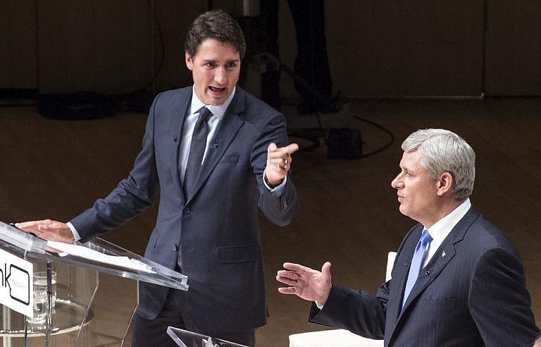 Trudeau and Harper trade words during the Munk Debate on foreign affairs, in Toronto, on Sept. 28, 2015 (Andrew Vaughan/CP)
