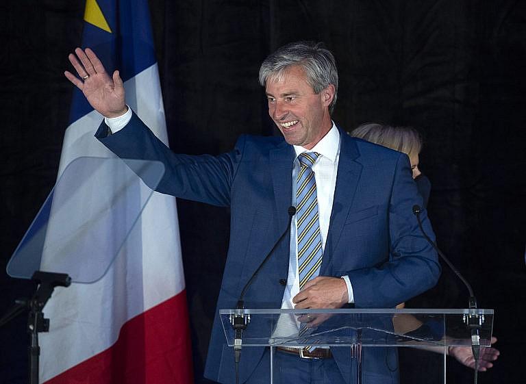 Nova Scotia Progressive Conservative leader Tim Houston waves to supporters after winning a majority government in the provincial election at the Pictou County Wellness Centre in New Glasgow, N.S. on Tuesday, Aug. 17, 2021. THE CANADIAN PRESS/Andrew Vaughan