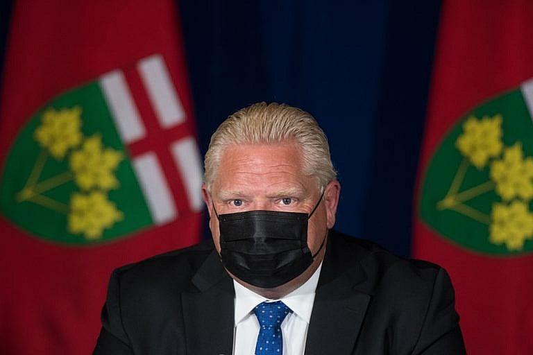 Ontario Premier Doug Ford listens to a question during a press conference announcing the enhanced COVID-19 vaccine certificate system, at Queen's Park in Toronto on Wednesday, September 1, 2021. THE CANADIAN PRESS/ Tijana Martin