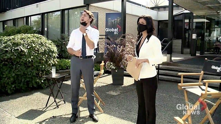 Prime Minister Trudeau yells at protestors ahead of an interview with Neetu Garcha outside the broadcaster’s Burnaby, B.C., station. (Courtesy of Global News)