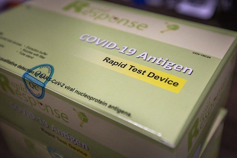 Rapid response COVID-19 antigen test devices pictured in Kingston, Ont. on Dec. 10, 2021. (Lars Hagberg/CP)