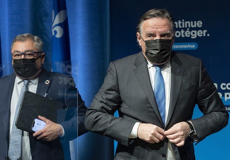 Legault leaves a news conference in Montreal, on Dec. 30, 2021 (Graham Hughes/CP)