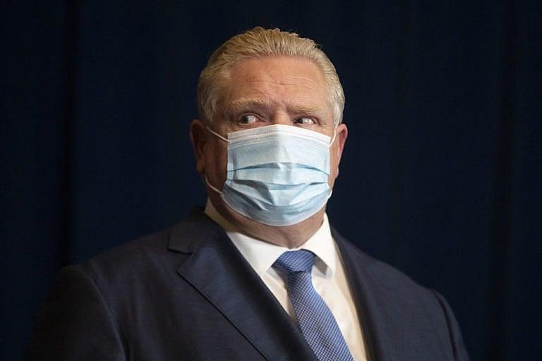 Ford attends a news conference in Toronto, as further restrictions are announced to combat the spread of the COVID-19 Omicron variant, on Jan. 3, 2022. (Chris Young/The Canadian Press)