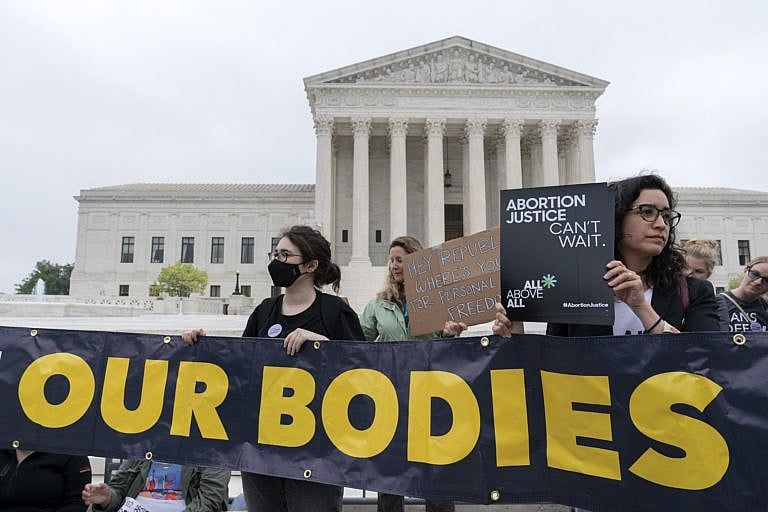 Demonstrators protest outside of the U.S. Supreme Court Tuesday, May 3, 2022 in Washington. (Jose Luis Magana/Associated Press)